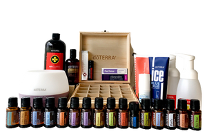 An assortment of essential oil blends from doterra, including multiple small bottles of oils, diffusers, and larger containers, displayed against a white background.