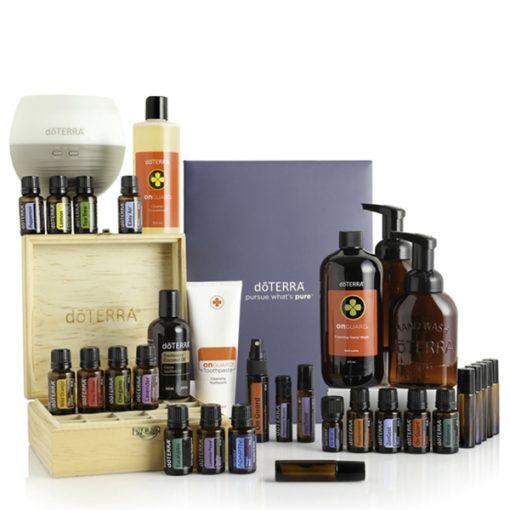 A collection of Nature's Solution Comprehensive Starter Pack branded wellness products including essential oil blends, skincare products, and a wooden box, arranged neatly on a white background.