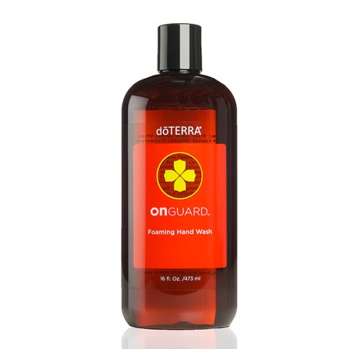 A bottle of On Guard® All Natural Softgel Beadlets foaming hand wash, with a clear label displaying the product name and details, against a white background. The bottle is amber-colored and contains 16 oz.