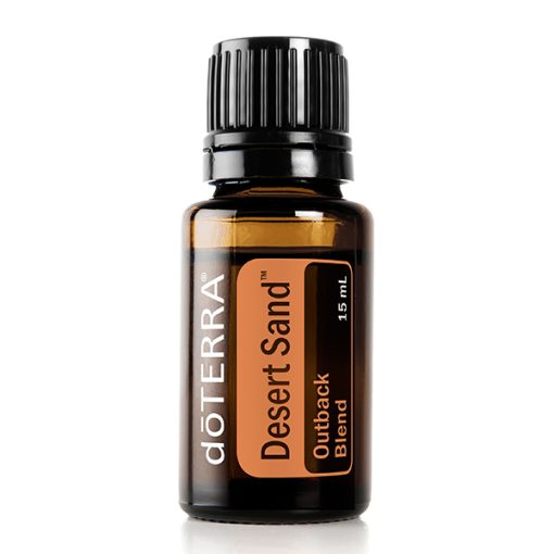A small bottle of doterra desert sand essential oil blends with a clear label on a white background. The bottle has a black cap and contains 15 ml of the product.