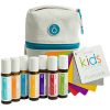 A collection of the best doterra essential oils in rollers designed for kids, displayed alongside flashcards and a white carrying case with an embossed pattern and blue zipper.