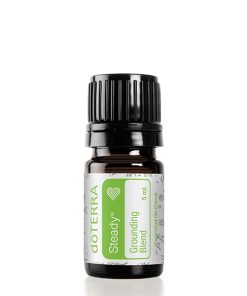 A small bottle of doTERRA Steady Grounding Blend essential oil, 15 ml size, displayed against a plain white background. The label is visible with green accents.