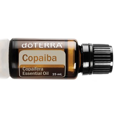 A brown glass bottle labeled "Copaiba oil, 15 ml" with a black cap, displayed horizontally on a white background.